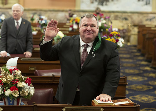 Rep. Todd Polinchock is sworn into office in the chamber of the House of Representatives.